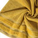 Ręcznik frotte z welurową bordiurą i lśniącą nicią GLORY 70X140 musztardowy